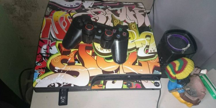 PS3 VINYL WRAPPED WITH GAMES